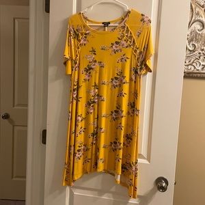 Yellow floral patterned sun dress.